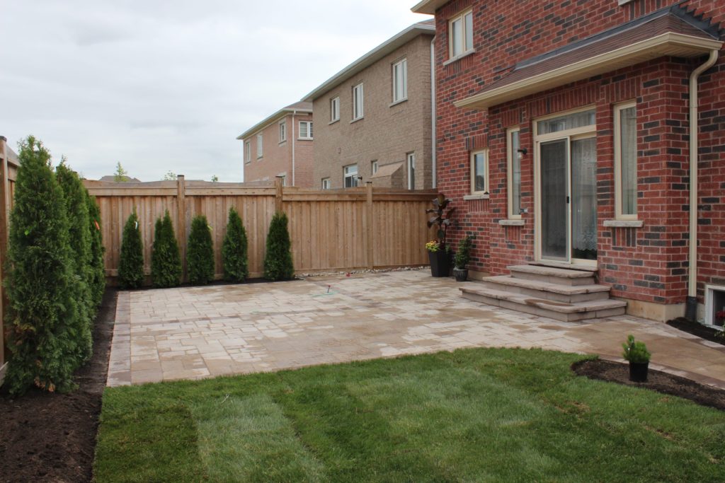 interlocking patio, sodding, flagstone steps, evergreens