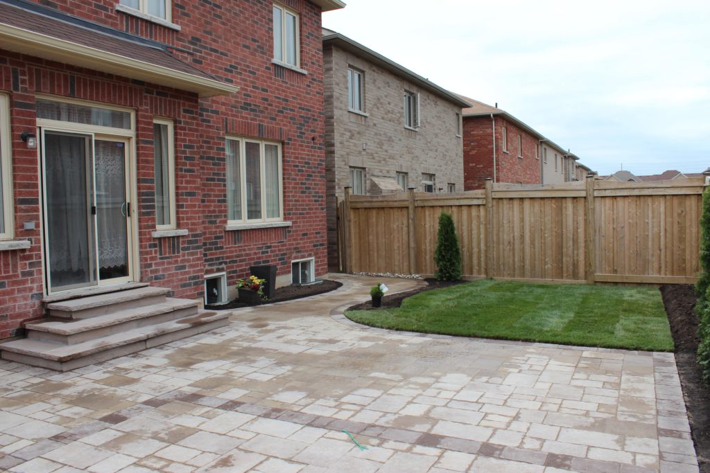 interlocking patio, sodding, flagstone steps, evergreens