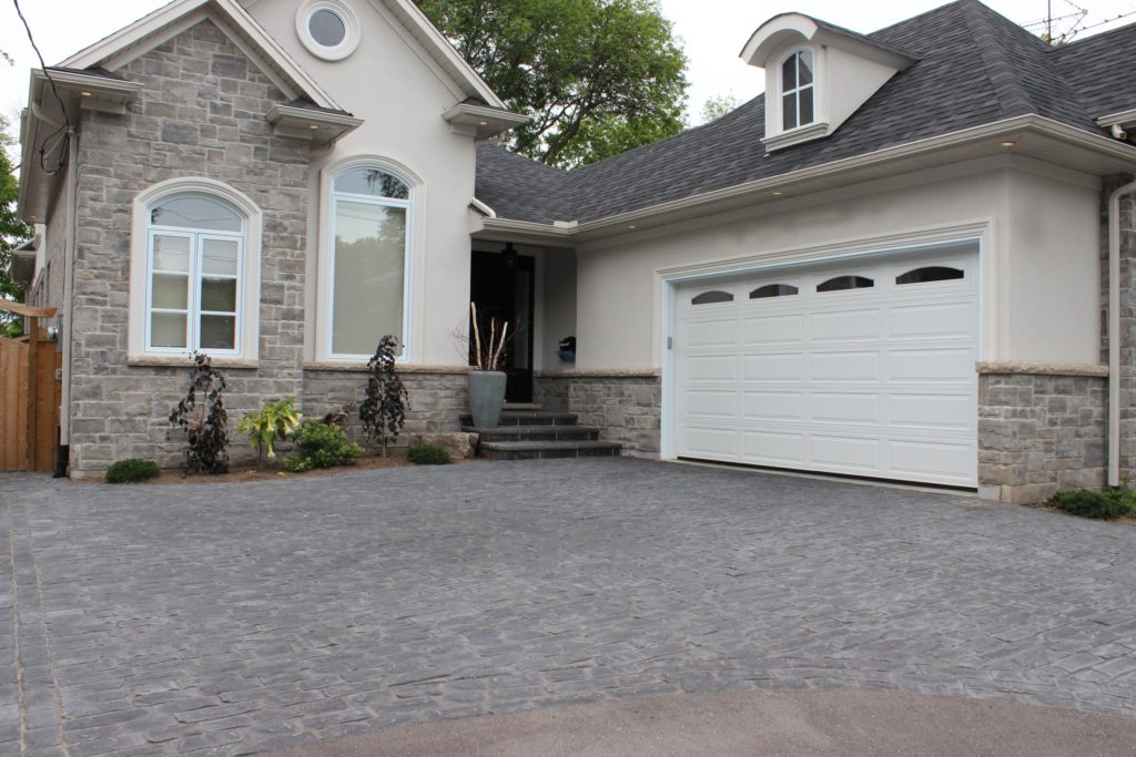 interlocking driveway, shrubs, trees, plants