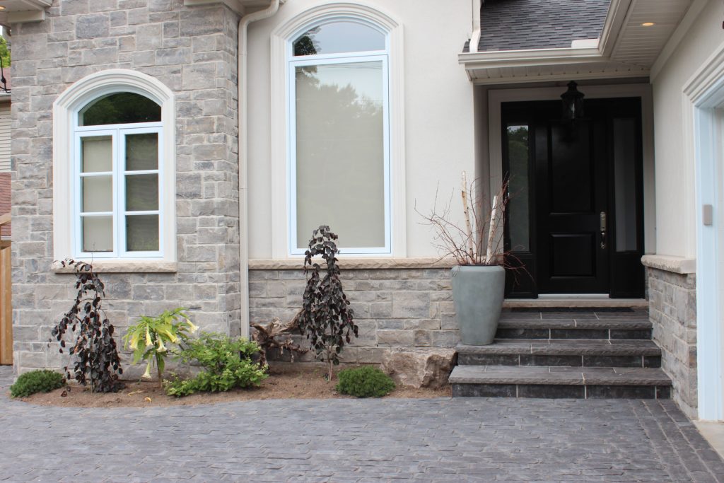 interlocking driveway, shrubs, trees, plants, flagstone steps