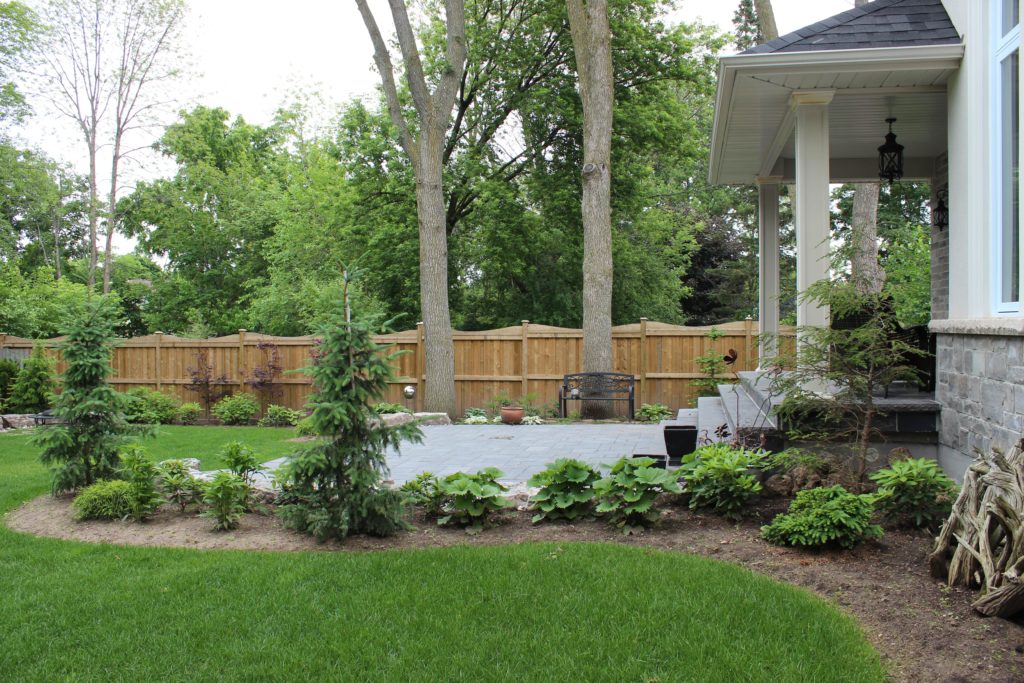 Interlocking Patio, Flagstone Steps, Boulders, Trees, Shrubs, Hedges, Sodding, backyard landscaping