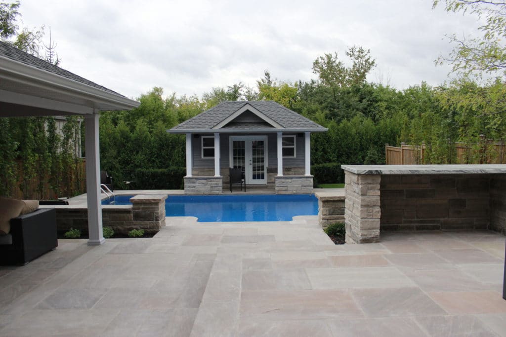 pool landscaping, flagstone patio, softscape, retaining wall, steps, cabana,