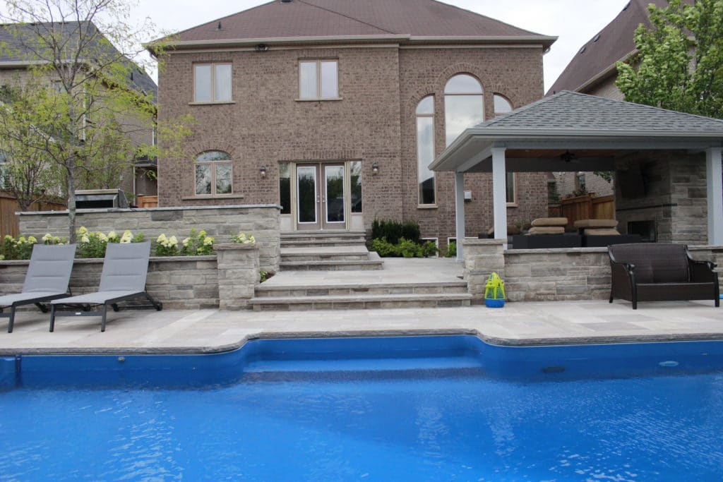 pool landscaping, flagstone patio, softscape, retaining wall, steps, cabana,