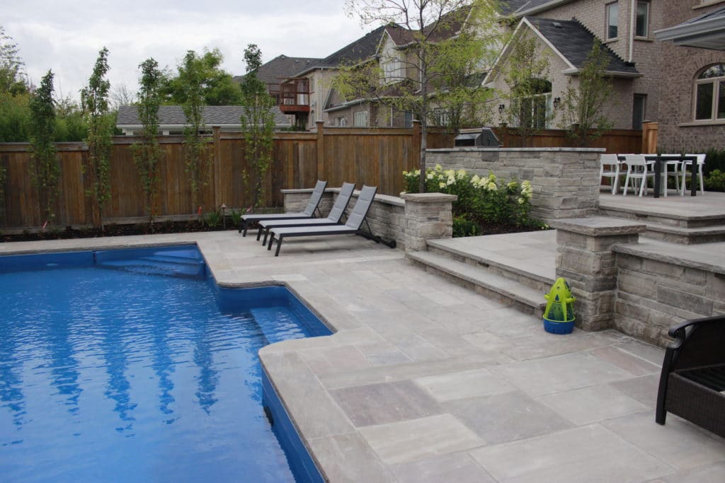 pool landscaping, flagstone patio, softscape, retaining wall, steps